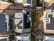 Aerial view of a house with solar panels and a backyard at 10226 Worchester St, Commerce City, CO 80022