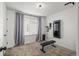 Well-lit bedroom with neutral tones and carpeted floor at 10226 Worchester St, Commerce City, CO 80022