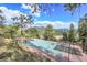 Private outdoor basketball court with mountain backdrop at 3864 Valley Dr, Evergreen, CO 80439