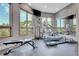 Well-equipped home gym featuring treadmill and weight machine at 3864 Valley Dr, Evergreen, CO 80439