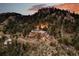 Mountaintop estate with solar panels and outdoor space at 3864 Valley Dr, Evergreen, CO 80439