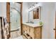 Bathroom with double vanity and walk-in shower at 3864 Valley Dr, Evergreen, CO 80439