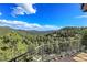 Spectacular mountain views from the home's deck at 3864 Valley Dr, Evergreen, CO 80439