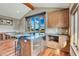 Kitchenette with granite countertop and stainless steel appliances at 3864 Valley Dr, Evergreen, CO 80439