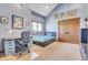 Bright bedroom with a desk, bed, and closet at 3864 Valley Dr, Evergreen, CO 80439