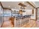 Open kitchen with stainless steel appliances and granite countertops at 3864 Valley Dr, Evergreen, CO 80439