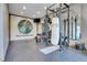 Fitness room with punching bag, weights, and mirror at 3864 Valley Dr, Evergreen, CO 80439