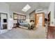 Spacious main bedroom with fireplace, high ceiling, and ample natural light at 3864 Valley Dr, Evergreen, CO 80439