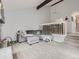 Spacious living room featuring a comfortable sectional sofa and access to a patio at 7640 S Monaco Cir, Centennial, CO 80112