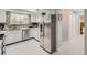 Well-equipped kitchen boasting stainless steel appliances and ample cabinet space at 7640 S Monaco Cir, Centennial, CO 80112