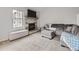 Cozy living room featuring a fireplace and comfortable seating at 7640 S Monaco Cir, Centennial, CO 80112