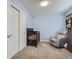 Light and airy Bedroom with crib, recliner, and ample closet space at 7640 S Monaco Cir, Centennial, CO 80112