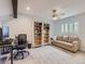 Home office with built-in shelving, desk and couch at 7640 S Monaco Cir, Centennial, CO 80112