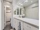 Main bathroom with a double vanity and granite countertop at 7640 S Monaco Cir, Centennial, CO 80112