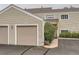 Townhouse exterior with two-car garage at 7640 S Monaco Cir, Centennial, CO 80112