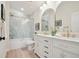 Elegant bathroom with double vanity, marble accents, and a soaking tub at 872 Thames St, Highlands Ranch, CO 80126