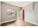 Front entryway with hardwood floors and an exterior door at 4411-4415 Grant St, Denver, CO 80216