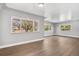 Living room with hardwood floors and large windows at 3640 S Sherman St, Englewood, CO 80113