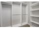 Large walk-in closet with hanging rods and shelving at 7030 S Buchanan St, Aurora, CO 80016