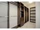 Large walk-in closet with ample shelving and hanging space at 7030 S Buchanan St, Aurora, CO 80016