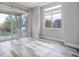 Dining room with hardwood floors and access to the backyard at 7030 S Buchanan St, Aurora, CO 80016