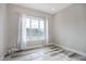 Bright office with large window and hardwood floors at 7030 S Buchanan St, Aurora, CO 80016