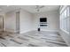 Open living space with hardwood floors and ceiling fan at 7030 S Buchanan St, Aurora, CO 80016