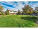 Spacious grassy backyard, perfect for outdoor activities at 6390 S Quay Ct, Littleton, CO 80123