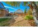 Landscaped backyard with garden and seating area at 6390 S Quay Ct, Littleton, CO 80123