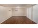 Spacious finished basement room with laminate flooring and double closets at 924 Quitman St, Denver, CO 80204