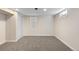 Finished basement bedroom with window, carpet, and neutral walls at 2230 Jamaica St, Aurora, CO 80010