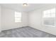 Spacious, unfurnished bedroom with soft, gray carpeting at 1562 Farmstead St, Brighton, CO 80601