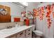 Clean bathroom with a shower/tub combo and updated vanity at 750 S Clinton St # 12D, Denver, CO 80247