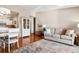 Living room features hardwood floors, neutral color palette, and an abundance of natural light at 750 S Clinton St # 12D, Denver, CO 80247
