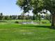 Serene pond with a water fountain, offering a tranquil atmosphere at 750 S Clinton St # 12D, Denver, CO 80247