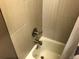 Modern bathroom with neutral tile and brushed nickel fixtures at 1020 15Th St # 26I, Denver, CO 80202