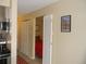 View of the bedroom through folding doors from the kitchen area at 1020 15Th St # 26I, Denver, CO 80202