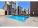 Rooftop pool with city skyline backdrop at 1020 15Th St # 26I, Denver, CO 80202