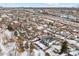 Wide shot of duplex near a river with city skyline in background at 2321 S Galapago St, Denver, CO 80223