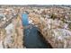 Aerial view showing river, bridge, and park at 2321 S Galapago St, Denver, CO 80223