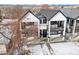 Two-story duplex with modern design and snowy landscape at 2321 S Galapago St, Denver, CO 80223