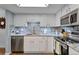 Modern kitchen with stainless steel appliances and granite counters at 13901 E Marina Dr # 105, Aurora, CO 80014