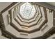 High-ceilinged building interior with an open atrium at 13901 E Marina Dr # 105, Aurora, CO 80014