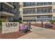 Attractive building exterior with landscaping and walkway at 13901 E Marina Dr # 105, Aurora, CO 80014
