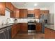 Modern kitchen with stainless steel appliances and granite countertops at 11213 Colony Cir, Broomfield, CO 80021