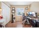 Spacious home office with ample natural light and wood floors at 5109 S Malta Way, Centennial, CO 80015