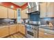 Well-equipped kitchen with stainless steel appliances and granite countertops at 3594 Palmer Ridge Dr, Parker, CO 80134