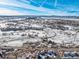 Aerial view showcasing the property's location and surrounding landscape at 567 Lake Gulch Rd, Castle Rock, CO 80104