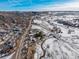 Aerial view of property showing its location near a road and river at 567 Lake Gulch Rd, Castle Rock, CO 80104