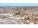 Aerial view of property with mountain views and surrounding neighborhood at 567 Lake Gulch Rd, Castle Rock, CO 80104